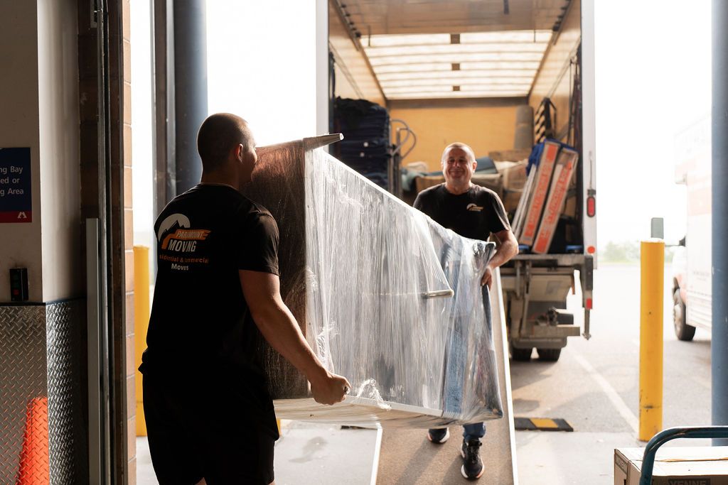 Moving truck and movers during student move in Edmonton