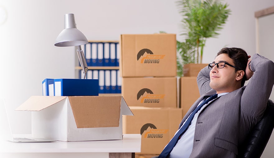 It shows an office worker who is thinking on how to choose the best commercial moving company in Calgary