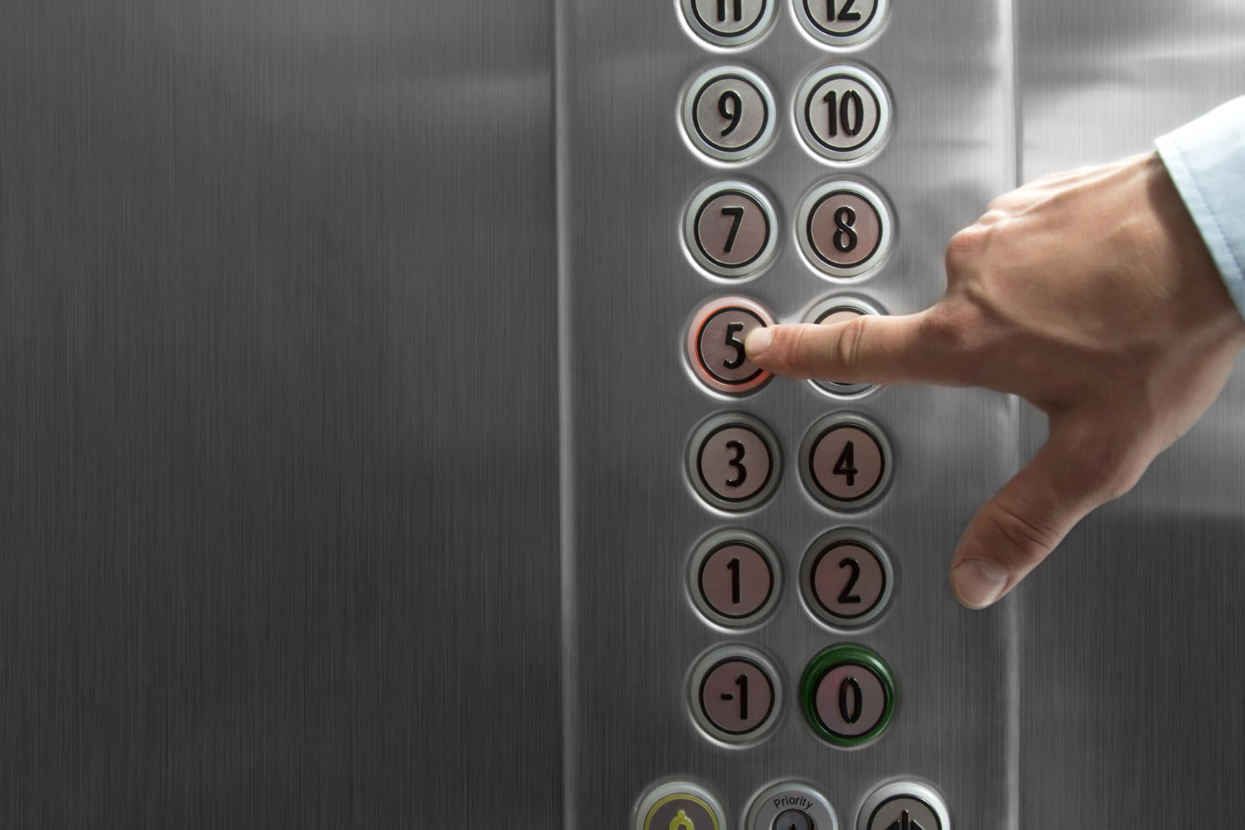 Pressing the floor button in the elevator that was booked for the move