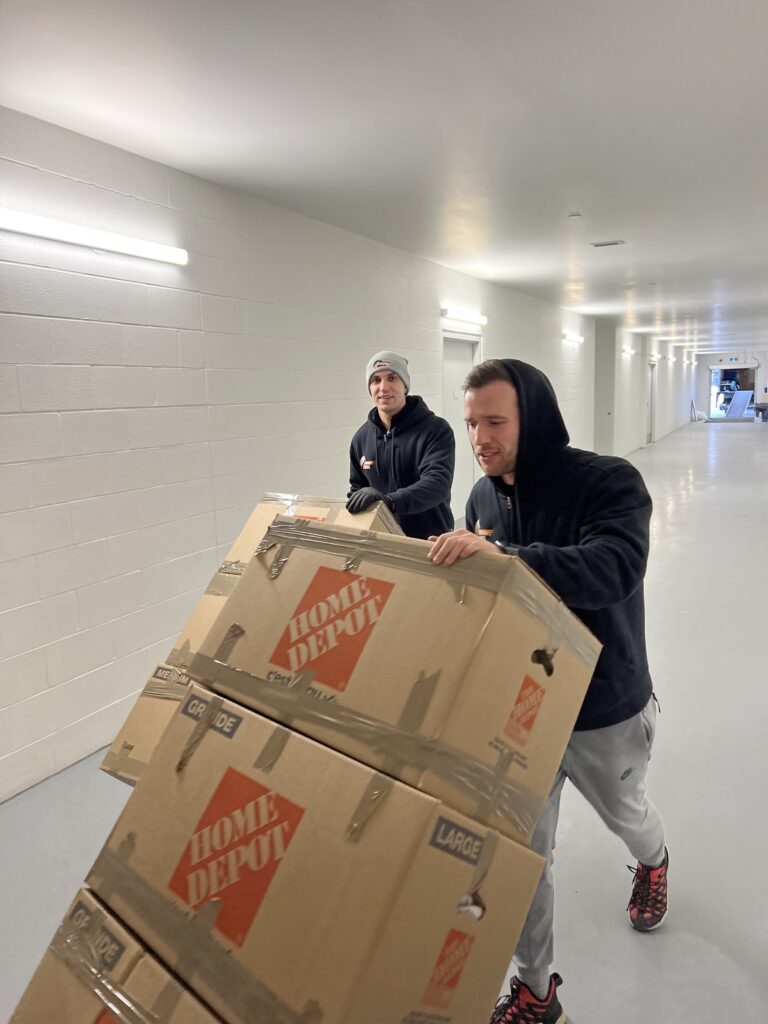 Paramount Moving crew unloading truck in Red Deer